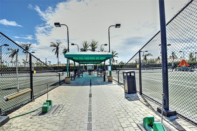 14250 Royal Harbour Ct Unit 817, Fort Myers, FL 33908 - view of tennis court featuring fence