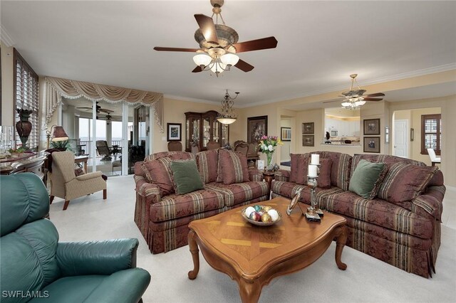 14250 Royal Harbour Ct Unit 817, Fort Myers, FL 33908 - living room featuring ceiling fan, carpet, and crown molding