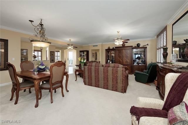 14250 Royal Harbour Ct Unit 817, Fort Myers, FL 33908 - dining space with a ceiling fan, crown molding, light carpet, and baseboards