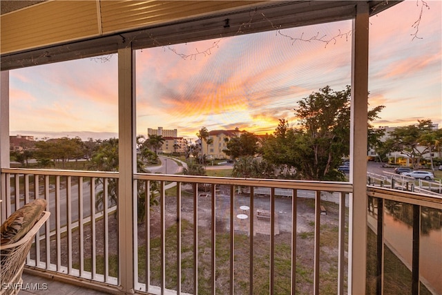 view of balcony at dusk