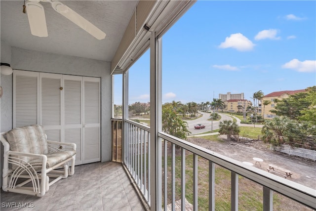 balcony featuring ceiling fan