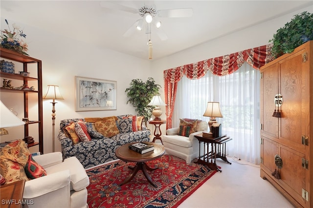 living room with carpet floors and ceiling fan