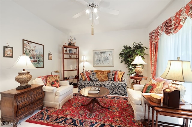 living room with a ceiling fan