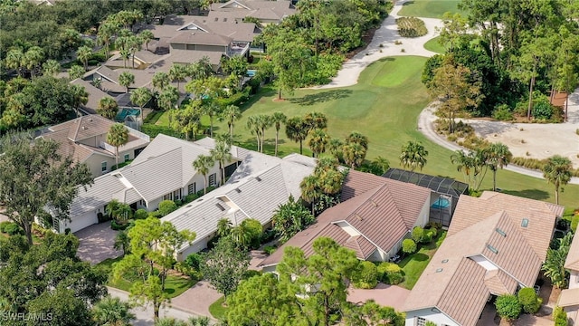 birds eye view of property featuring a residential view and view of golf course