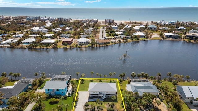 3311 Twin Lakes Ln, Sanibel, FL 33957 - aerial view of residential area featuring a large body of water and property boundaries highlighted