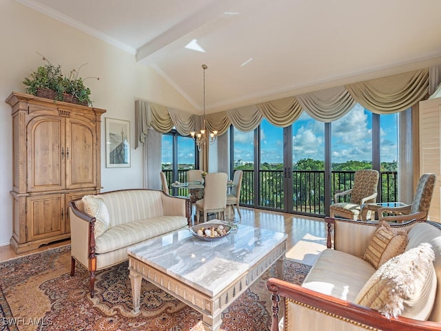 living room with an inviting chandelier, ornamental molding, lofted ceiling with beams, and a wealth of natural light