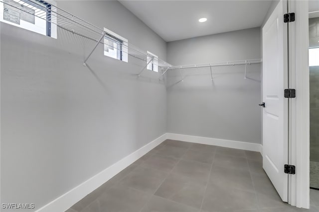 walk in closet featuring tile patterned floors