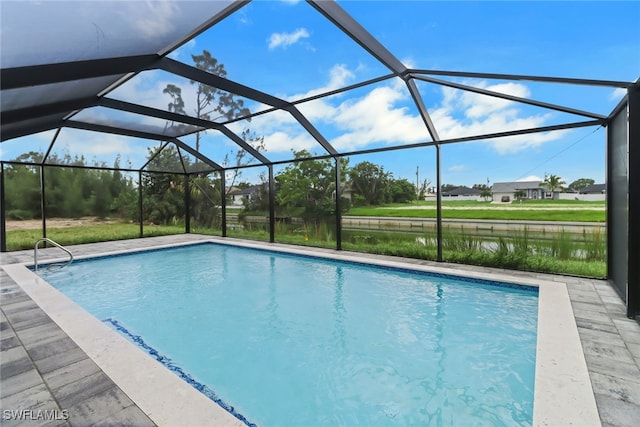 view of pool featuring a lanai