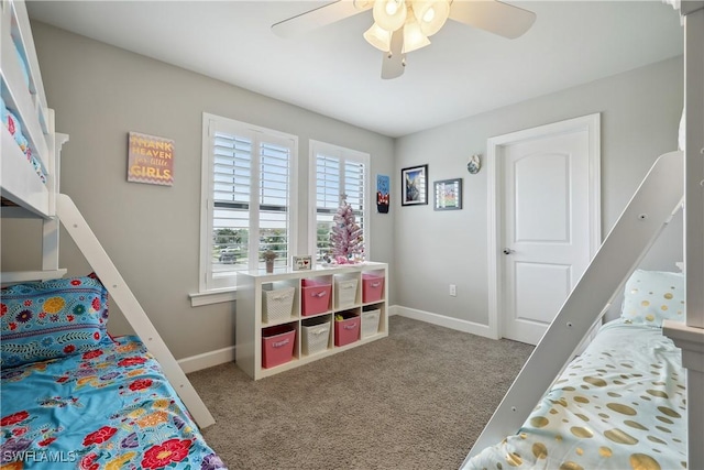 bedroom with ceiling fan and light colored carpet