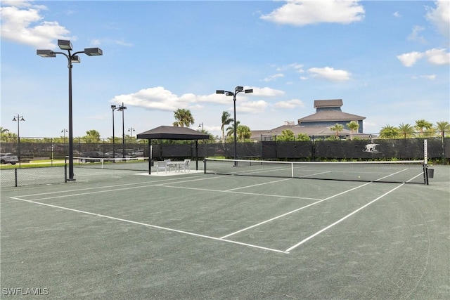 view of sport court with a gazebo