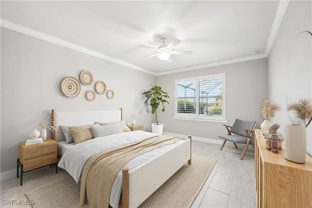 bedroom with ceiling fan and crown molding