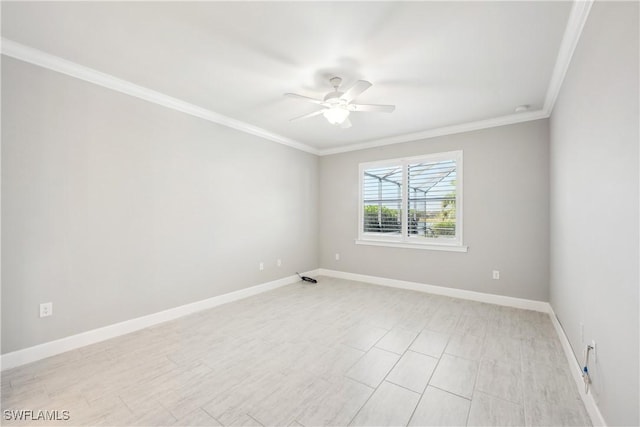 unfurnished room featuring ceiling fan and crown molding