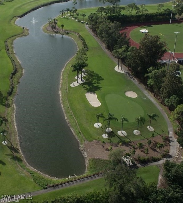 bird's eye view with a water view