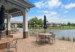 view of patio featuring a water view