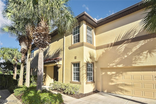 view of property featuring a garage