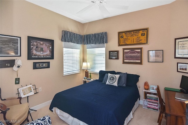 bedroom featuring carpet floors, baseboards, and ceiling fan