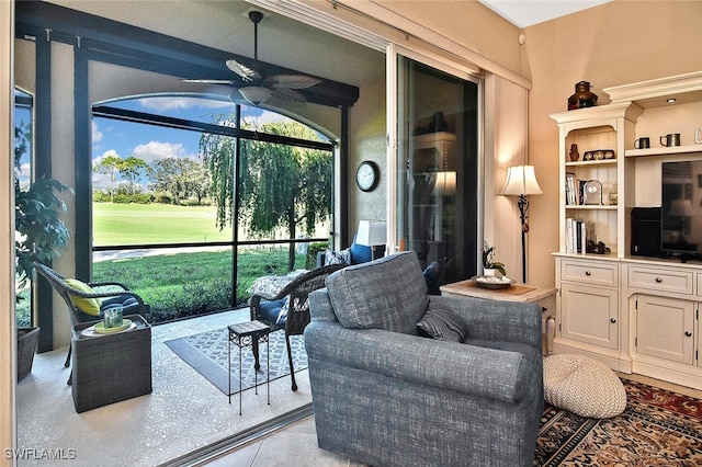 interior space featuring ceiling fan