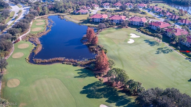 aerial view featuring a water view, golf course view, and a residential view