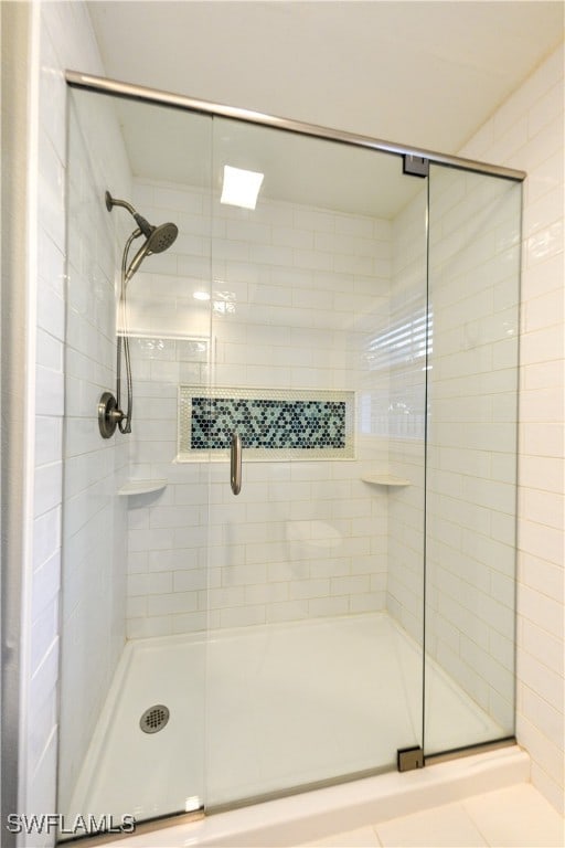 bathroom with an enclosed shower