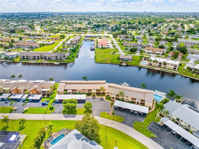 bird's eye view with a water view