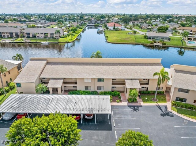 drone / aerial view featuring a water view