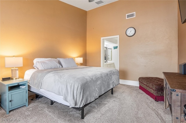 bedroom featuring light colored carpet