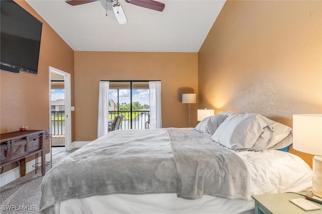 carpeted bedroom with ceiling fan, lofted ceiling, and access to exterior