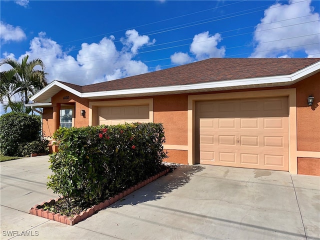 single story home with a garage