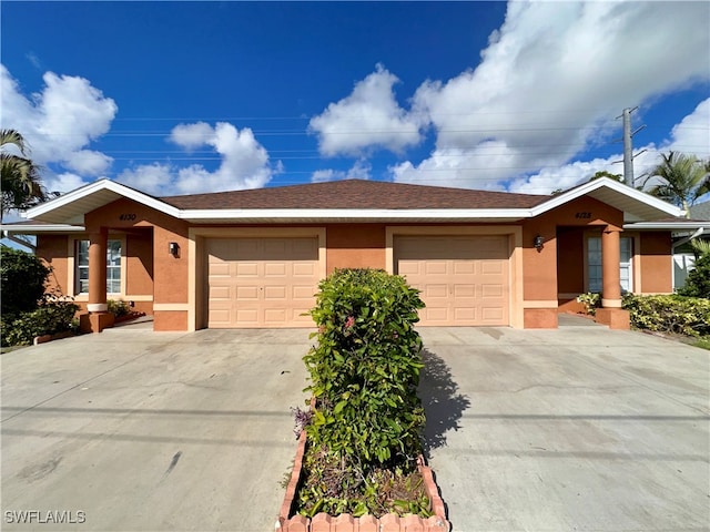 ranch-style home with a garage