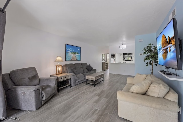 living room with hardwood / wood-style flooring