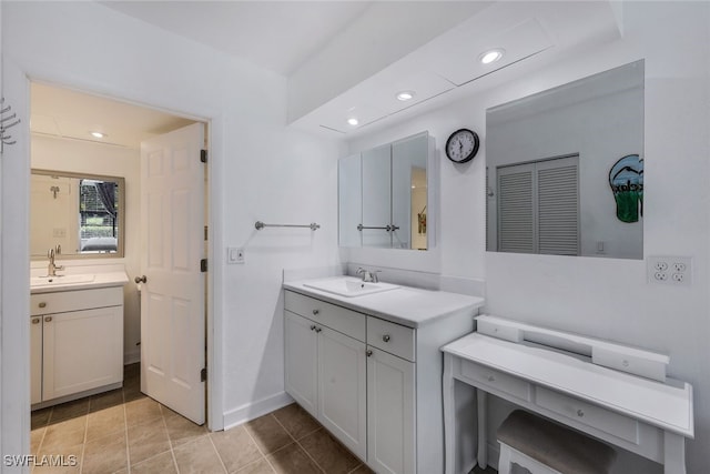 bathroom with vanity and tile patterned floors