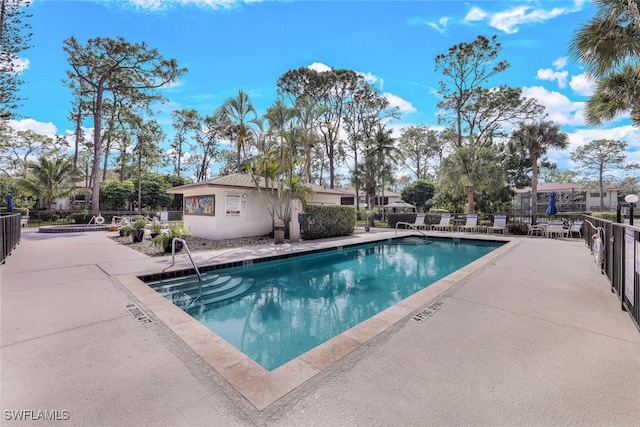 view of swimming pool featuring a patio area