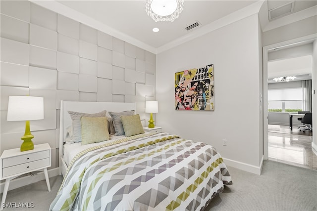 carpeted bedroom with ornamental molding