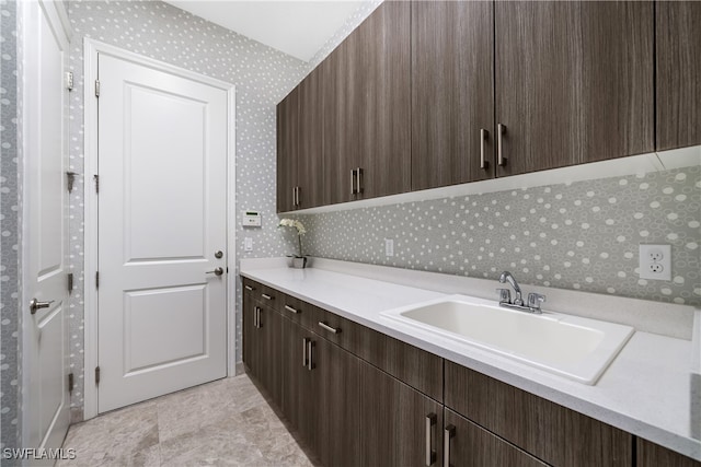 laundry room featuring sink