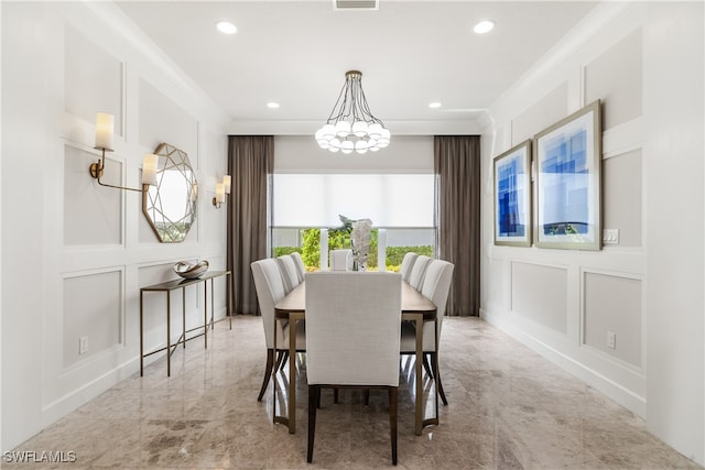 dining area featuring ornamental molding