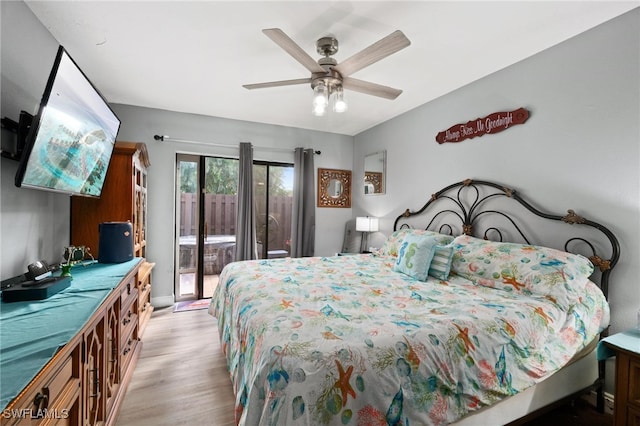 bedroom with light hardwood / wood-style flooring, ceiling fan, and access to outside