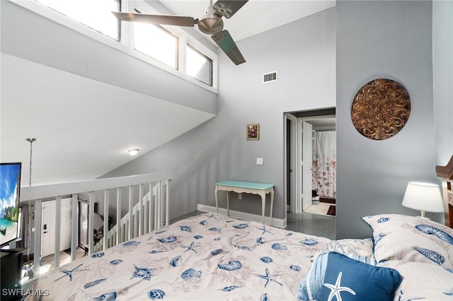 bedroom with high vaulted ceiling and ceiling fan