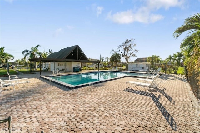 8913 Somerset Blvd, Fort Myers, FL 33919 - community pool featuring a patio area and fence