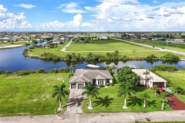 drone / aerial view with a water view