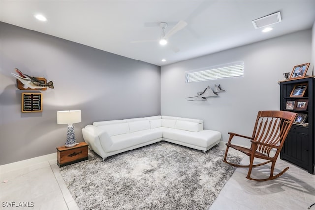 living room with light tile patterned flooring and ceiling fan