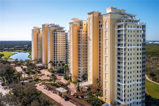 view of building exterior with a water view