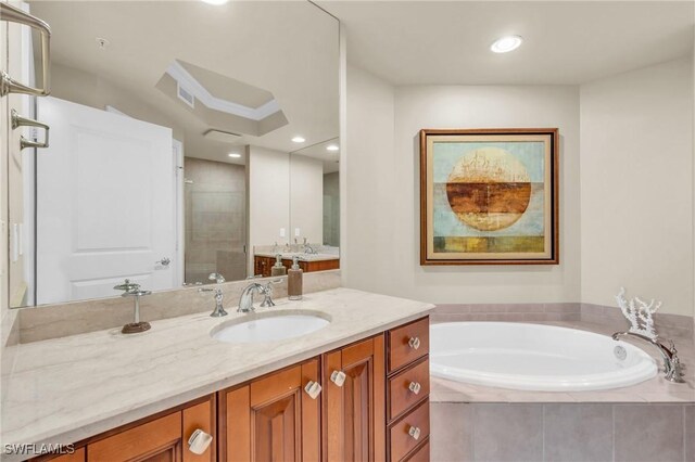 4751 W Bay Blvd Unit 1005, Estero, FL 33928 - full bath featuring vanity, a bath, a shower stall, and recessed lighting