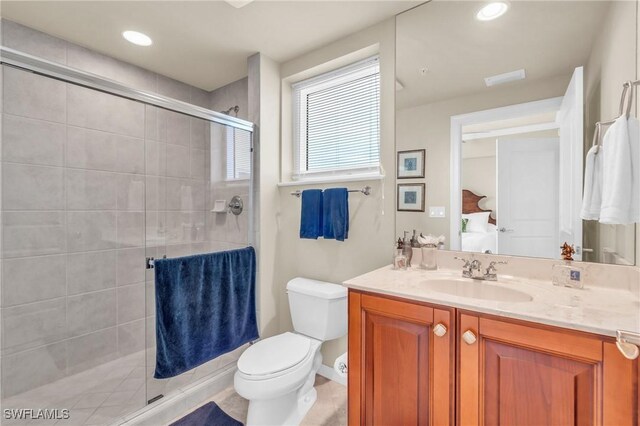 4751 W Bay Blvd Unit 1005, Estero, FL 33928 - full bath with vanity, a shower stall, toilet, and recessed lighting
