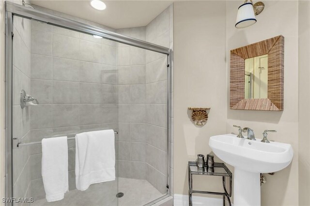 4751 W Bay Blvd Unit 1005, Estero, FL 33928 - full bathroom featuring a stall shower