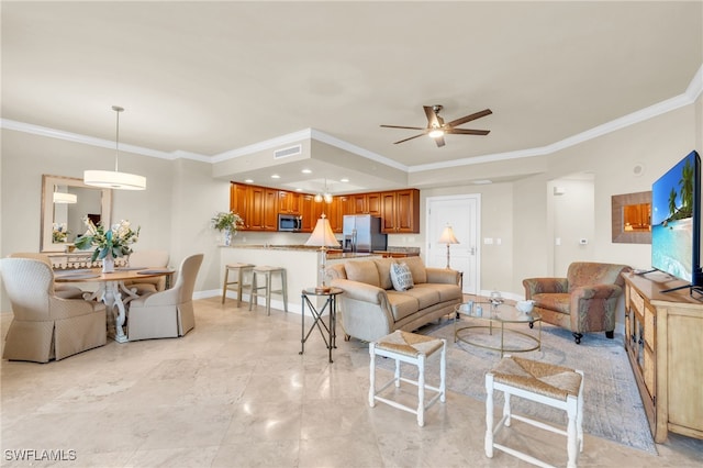 living room featuring ornamental molding and ceiling fan