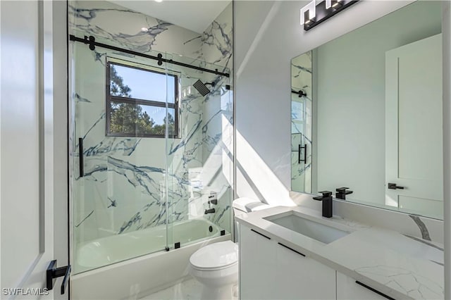 full bathroom with combined bath / shower with glass door, vanity, and toilet