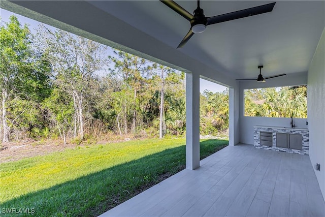 view of patio with a ceiling fan