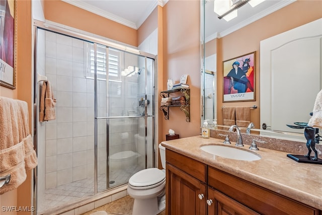 bathroom featuring an enclosed shower, toilet, vanity, crown molding, and tile patterned flooring