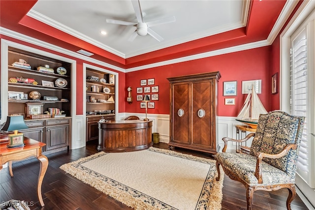 office area with plenty of natural light, dark hardwood / wood-style floors, built in features, and crown molding