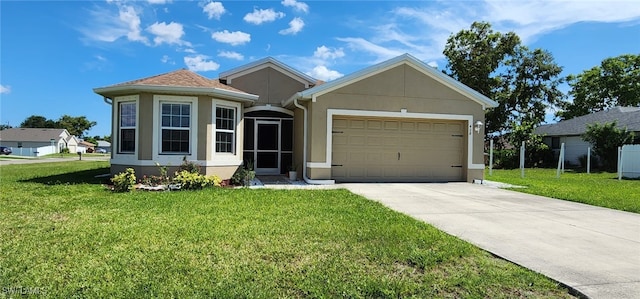 view of front of home with a garage and a front yard